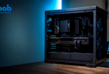 AI inference workstation with a large GPU, multiple power cables, system memory, and high-airflow cooling.